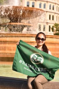 A CSU student holding a #ramsabroad flag in Rome, Italy
