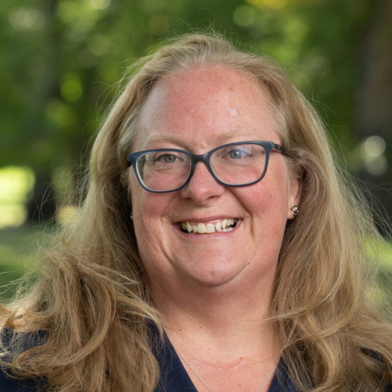 Professional Headshot of Bronwen Watts (she/her/hers)