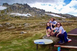 Four CSU Students at the base of a mountain.