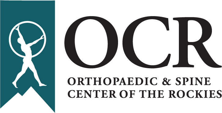 A company logo featuring a man, a mountain, and the letters O C R