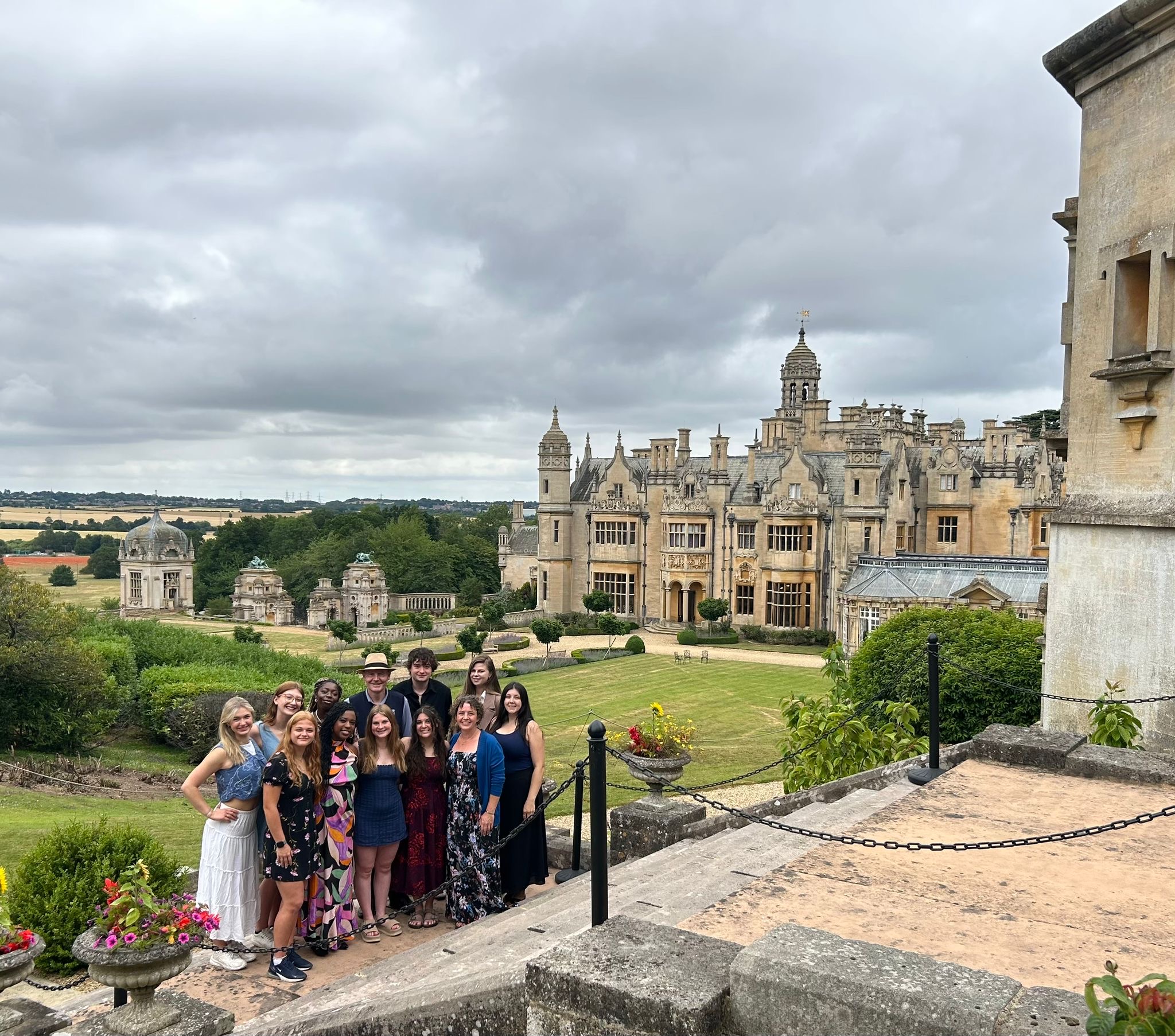 A group of students by a castle