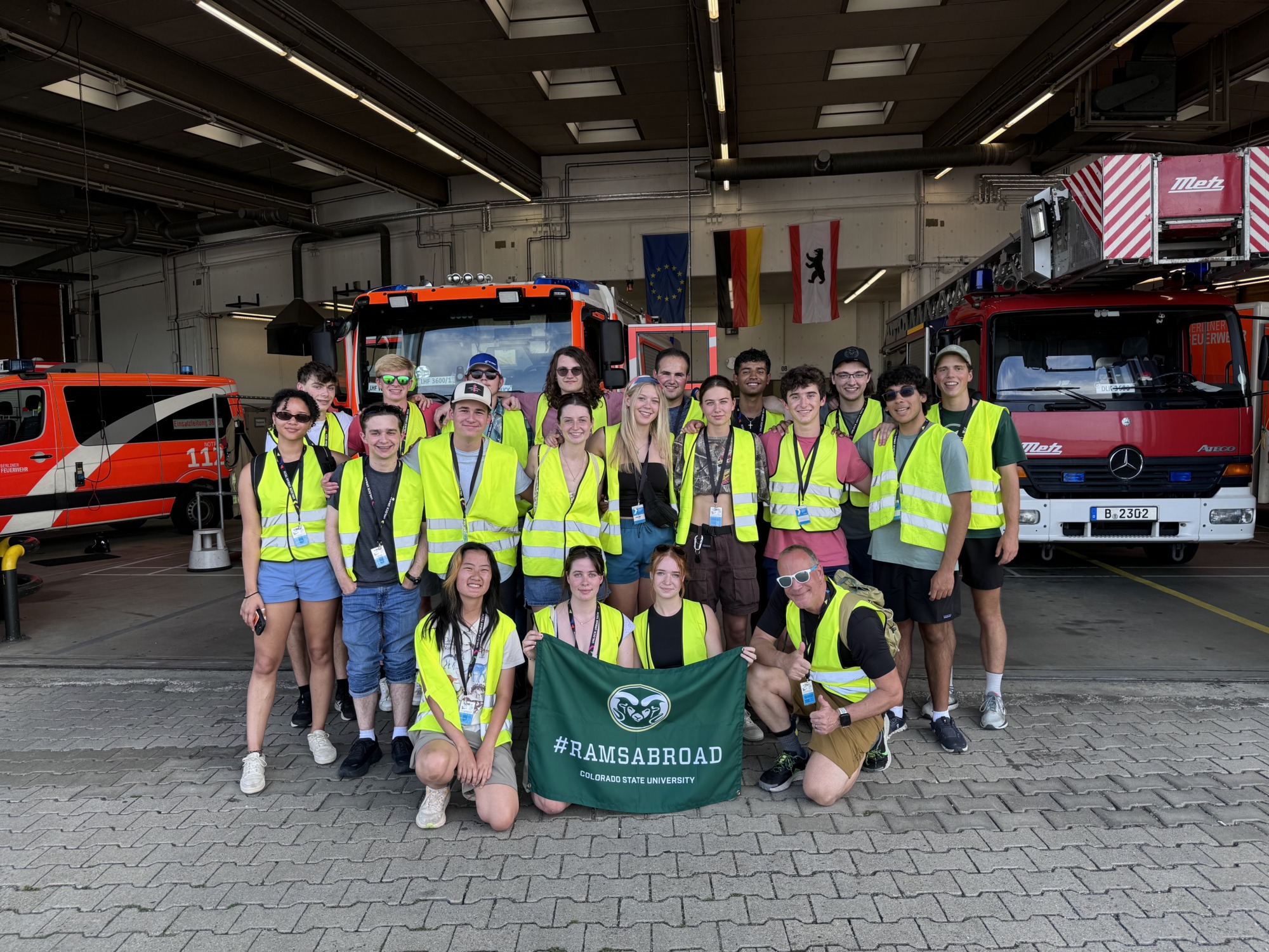 A group of students in safety vests
