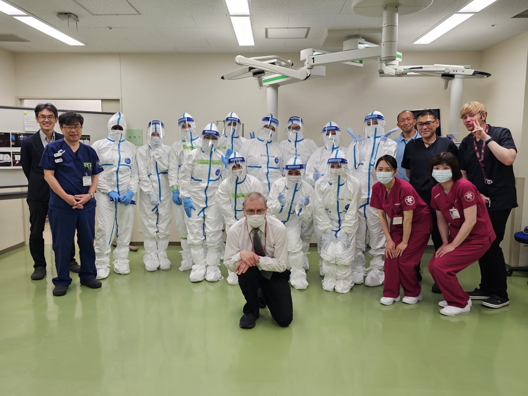 A group of students in hazmat suits